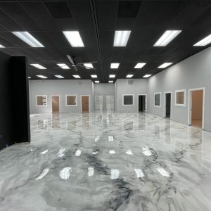 Metallic Marble Epoxy Floor Coating - A durable and decorative flooring option for commercial spaces, featuring a unique metallic marble design.